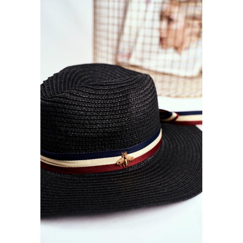 Tmavomodrý módní klobouk na léto se stuhou a zlatou mouchou pro dámy